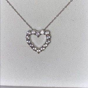 A diamond heart necklace.